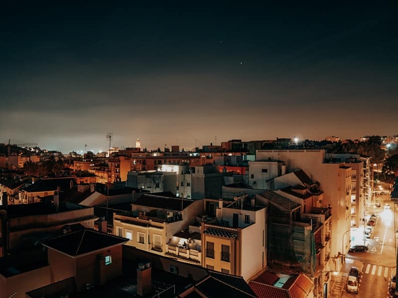 Roofs of Malaga at night